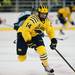 Michigan senior center Kevin Lynch skates after the puck in the third period on Friday. Daniel Brenner I AnnArbor.com